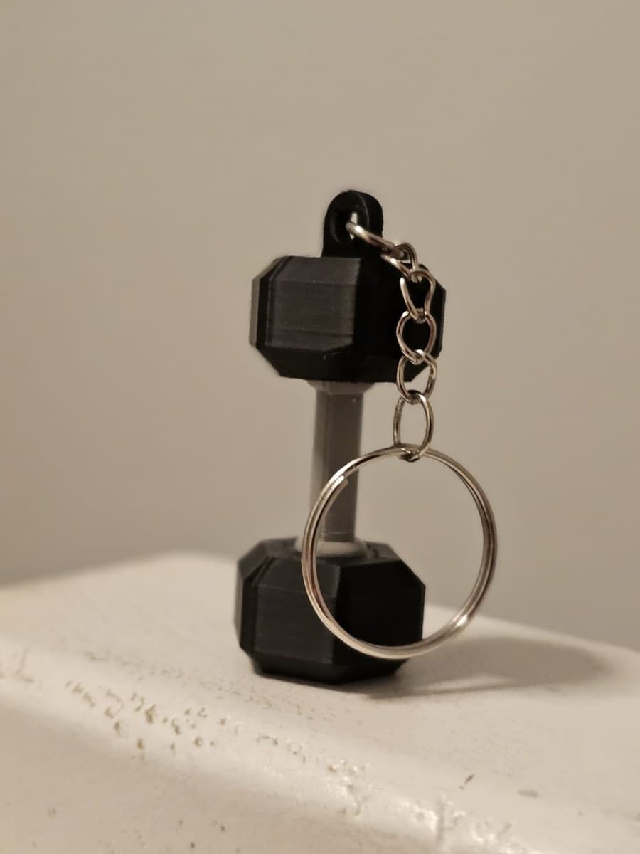 3D printed miniature hex dumbbell keychain in matte black
